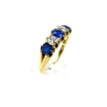 A spectacular, boxed, 18 ct yellow gold, diamond and sapphire, five stone ring