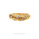 A vintage, 9 ct yellow gold ribbed ring, inset with brilliant-cut diamonds