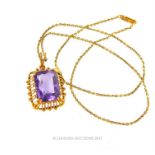 A vintage, 18 ct yellow gold, rectangular amethyst pendant and 14 ct chain