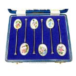 A cased set of six sterling silver and enamelled teaspoons
