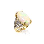 An exquisite,18 ct yellow gold, large opal and diamond ring