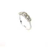 An 18 ct white gold, diamond, five stone ring