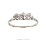 An exquisite, platinum, three-stone diamond ring