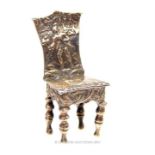 A late Victorian imported sterling silver miniature chair