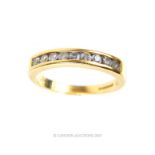 An exquisite, 18 ct yellow gold, nine stone diamond ring