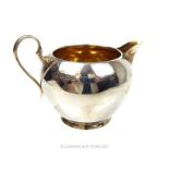 A sterling silver milk jug, William Hutton & Sons Ltd
