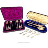 Two cases of sterling silver flatware, together with four teaspoons