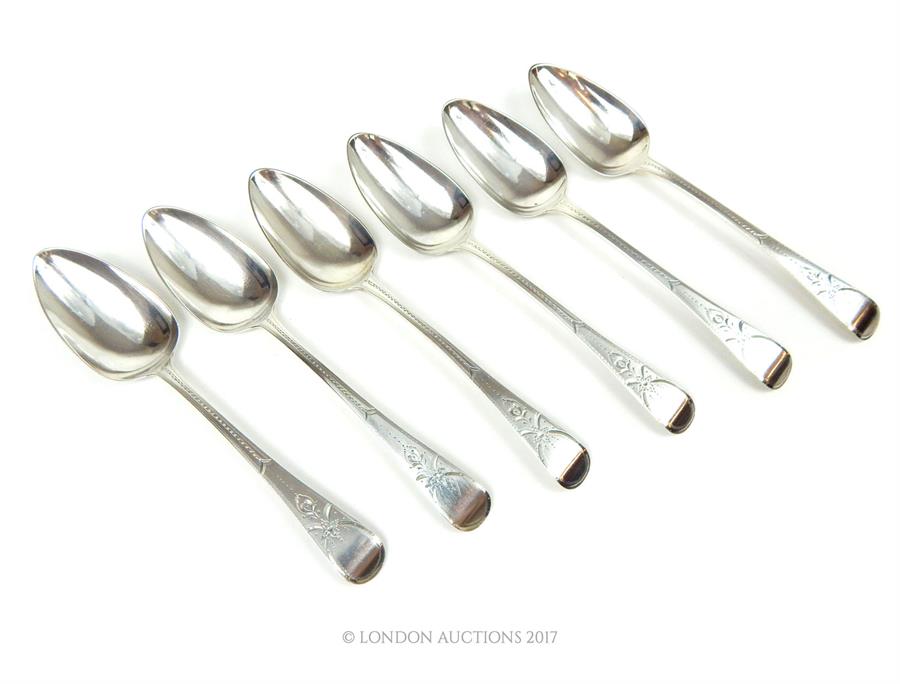 A set of six George III sterling silver table spoons