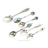 A collection of sterling silver and silver plated souvenir spoons for the USA and Canada