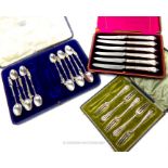 Cased sets of sterling silver teaspoons, forks, and knives