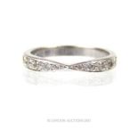 An 18 ct white gold and diamond ring