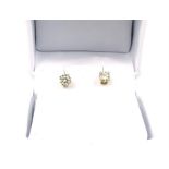 A pair of 18 ct yellow gold, diamond stud earrings (0.70 carats)