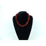 A faceted, beaded, banded-agate necklace