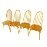 Four Ercol dining chairs with elm seats