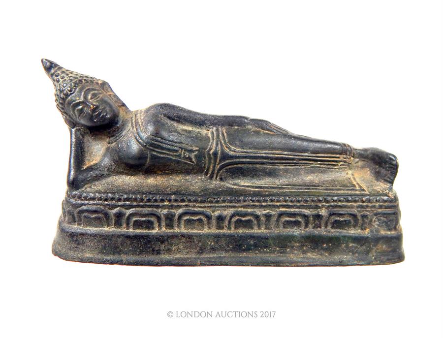 A late 19th century, fine, Burmese bronze, reclining figure