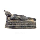 A late 19th century, fine, Burmese bronze, reclining figure