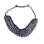 A grey, freshwater pearl, crocheted bib necklace