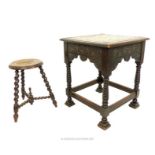 Late 19th century, carved oak table and stool