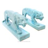 A pair of large Art Deco style French L&V Ceram panthers