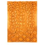 A carved wooden panel of hanging flowers; verso handwritten "Marja Riitta Korhonen -99"; 54.5cm x