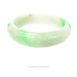 A Chinese carved jade bangle