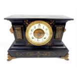 An American black marble mantle clock, Arabic numeral 11.1cm diameter dial, spelter lion mask