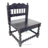 A late 17th Century Colonial Dutch East Indies Carved Ebony Chair, from Batavia or Sri Lanka