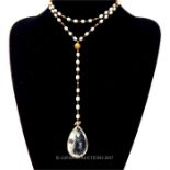 A silver-gilt, freshwater pearl necklace with a rock, crystal drop