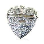 A silver embossed heart shaped locket; stamped 925; 4.5cm long.