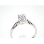 A single ascher cut diamond ring with 18ct white gold band; possibly 1.1ct; size J.