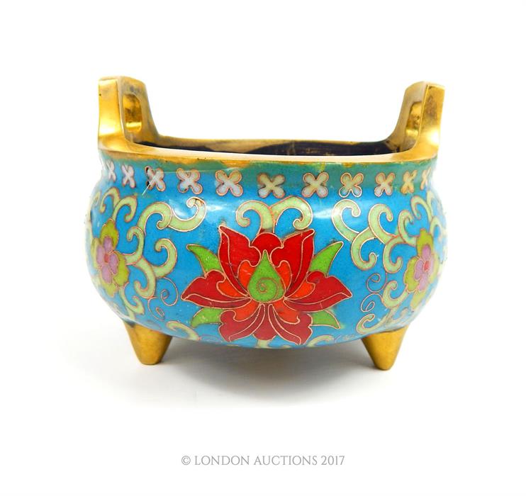 A Chinese twin handled cloisonne and gilt brass censer