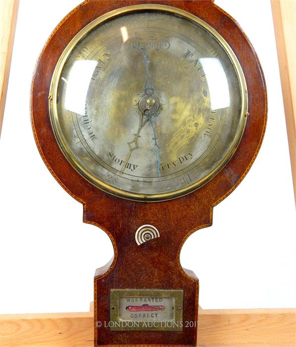 An Edwardian mahogany and inlaid barometer, having a silvered dial - Image 3 of 3