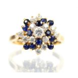 A 9 ct yellow gold, blue and white sapphire cluster ring