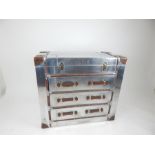 An Andrew Martin style studded aluminium clad chest