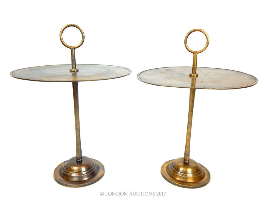 A pair of bronze circular occasional tables with hoop handles, raised on a circular step down base - Image 2 of 2