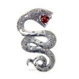 An unusual silver marcasite and large Garnet snake pendant with silver chain, both stamped 925; 5 cm