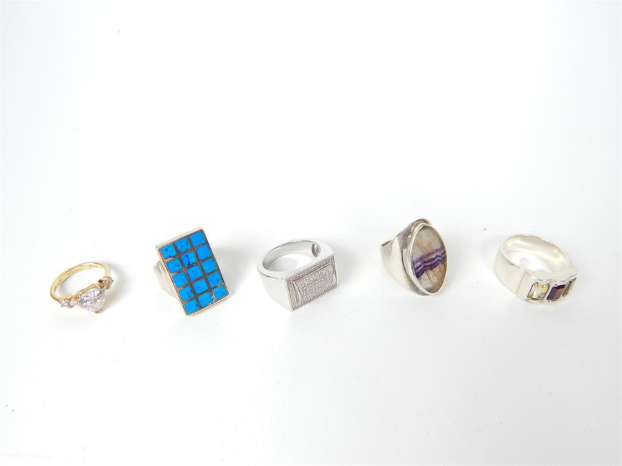 Five silver rings, including one set with Blue John, and another set with a heart form CZ
