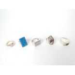 Five silver rings, including one set with Blue John, and another set with a heart form CZ