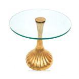 A contemporary circular glass occasional table raised on a gilt metal base