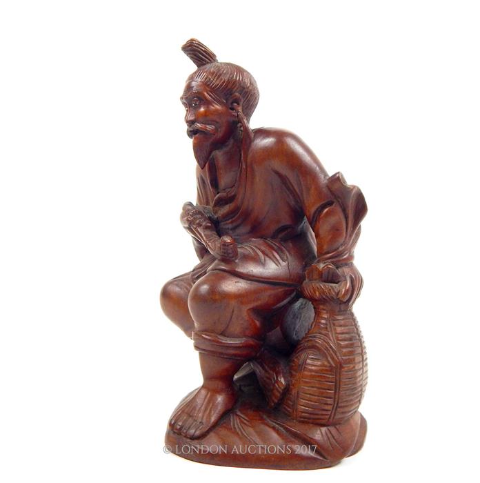 An early 20th century, Japanese, hand-carved boxwood figure of a seated gentleman - Image 2 of 2