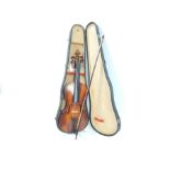 A vintage violin 56 x 20 x 8cm, with a bow and hard case