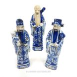 Three Chinese blue and white figures of sages