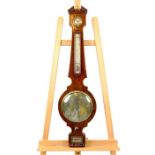 An Edwardian mahogany and inlaid barometer, having a silvered dial