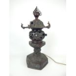 A late 19th / early 20th century Chinese bronze incense burner, converted to a table lamp