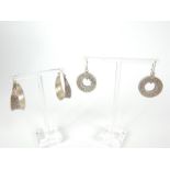 Two pairs of attractive, contemporary, circular, sterling silver earrings