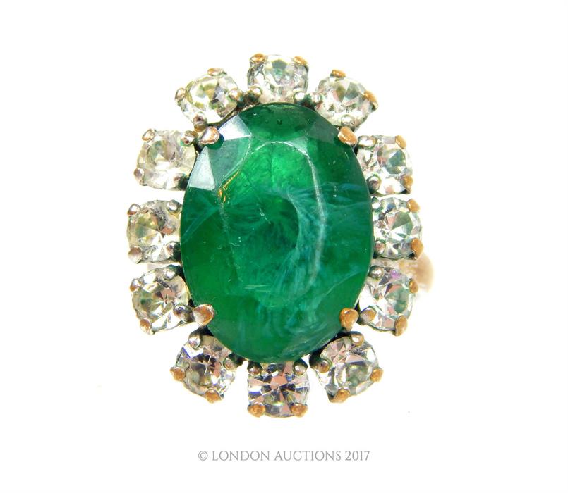 A vintage, 1970's, Christian Dior, green glass and paste cocktail ring