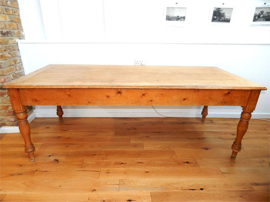 A large, Victorian, oak dining table