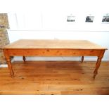 A large, Victorian, oak dining table