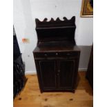 A Regency painted cabinet bookcase; 64.5cm wide; 127cm high.