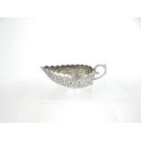 A 19th century Indian Kutch Silver Gravy Bowl with handle, possibly from Jaipur; 13.5cm long.